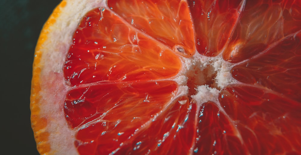 a close up of a grapefruit cut in half