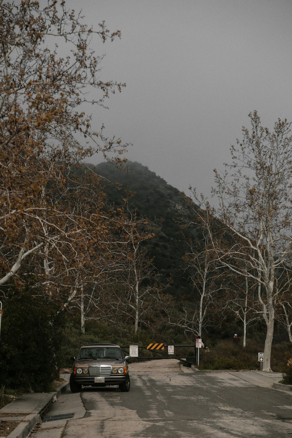 a car is parked on the side of the road