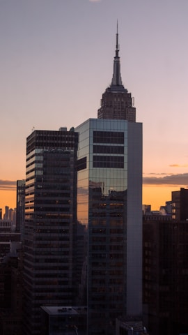 Balneário Camboriú skyline at sunset highlighting luxury buildings.
