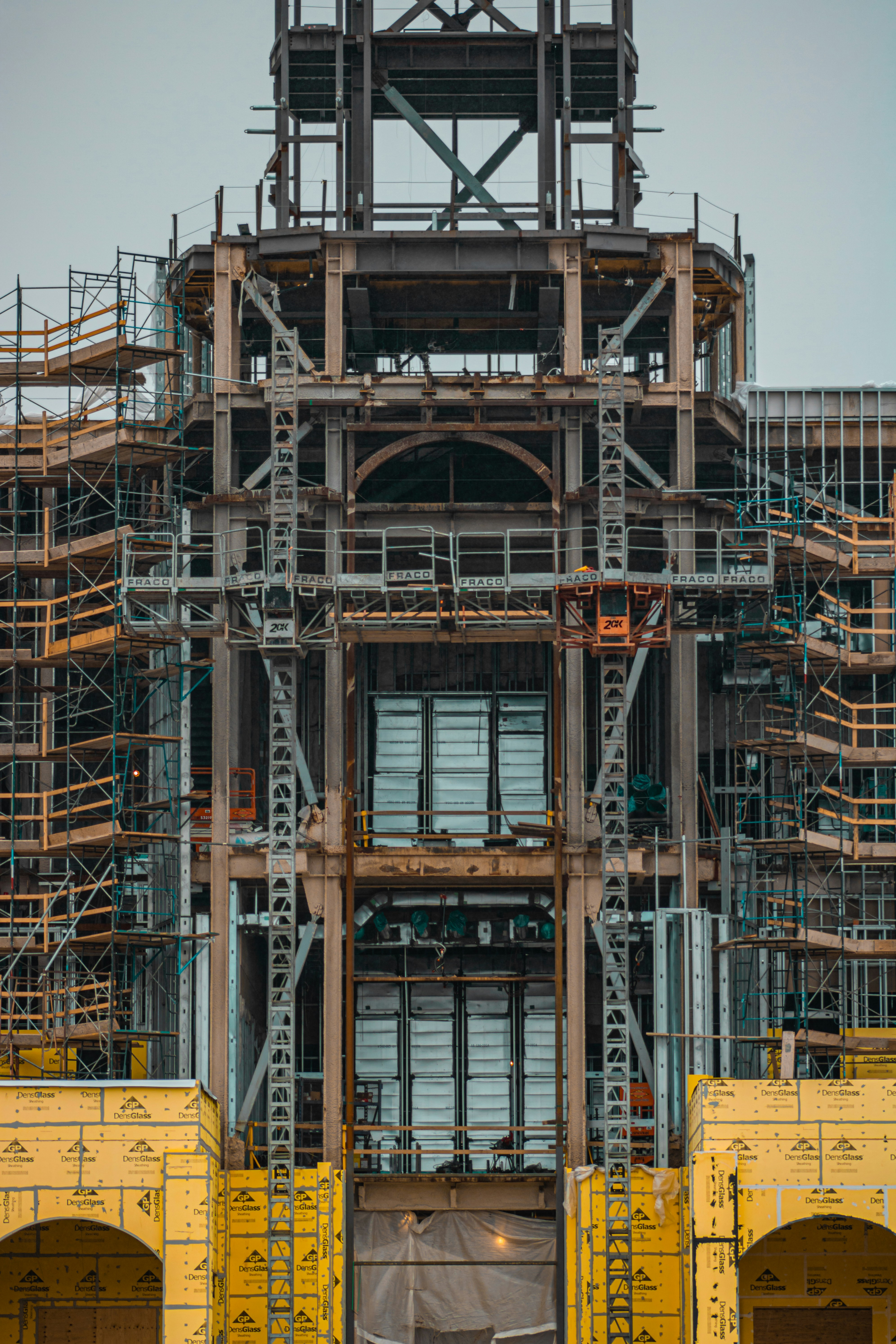 a large clock tower with scaffolding around it