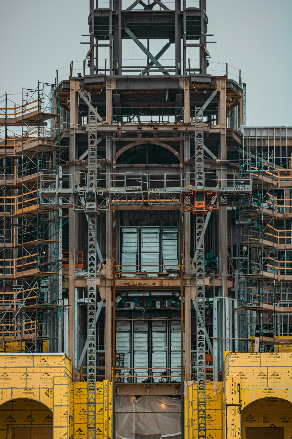 a large clock tower with scaffolding around it