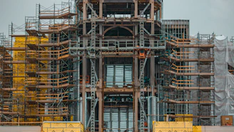 a large building with a clock on the side of it