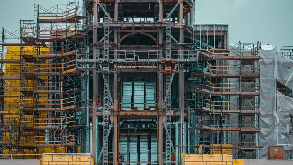 a very tall building with lots of scaffolding around it