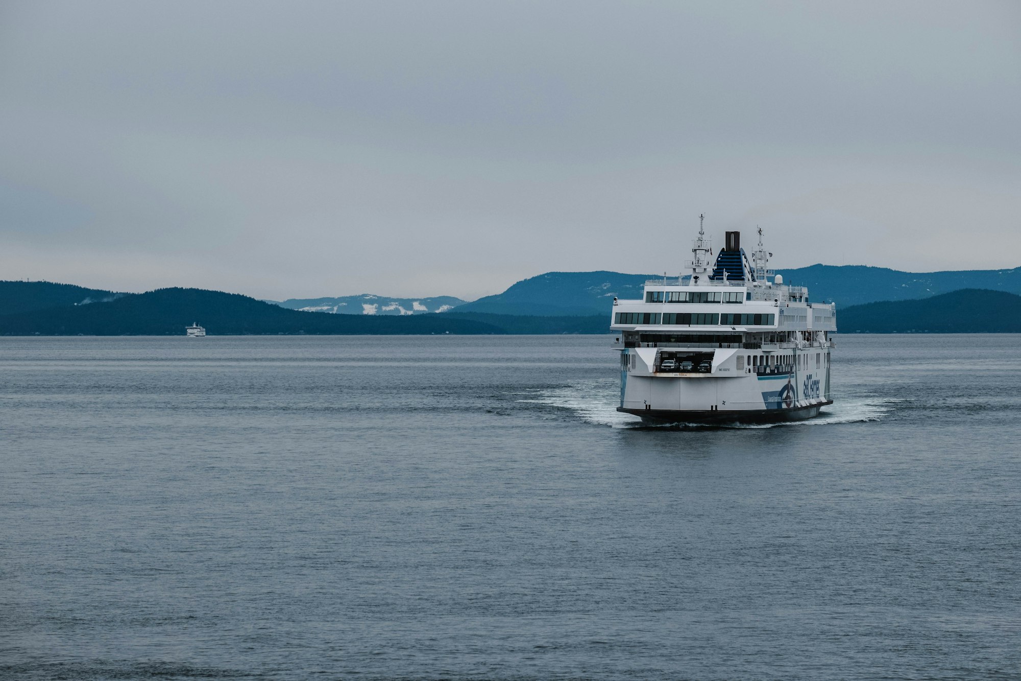 a large boat traveling across a large body of water