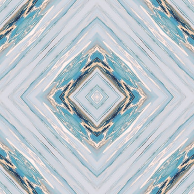 A digital artwork featuring a symmetrical geometric pattern with diamond shapes. The design has a kaleidoscopic effect with various shades of blue, pale yellow, and cream intertwining across the canvas, creating a visually compelling abstract look.
