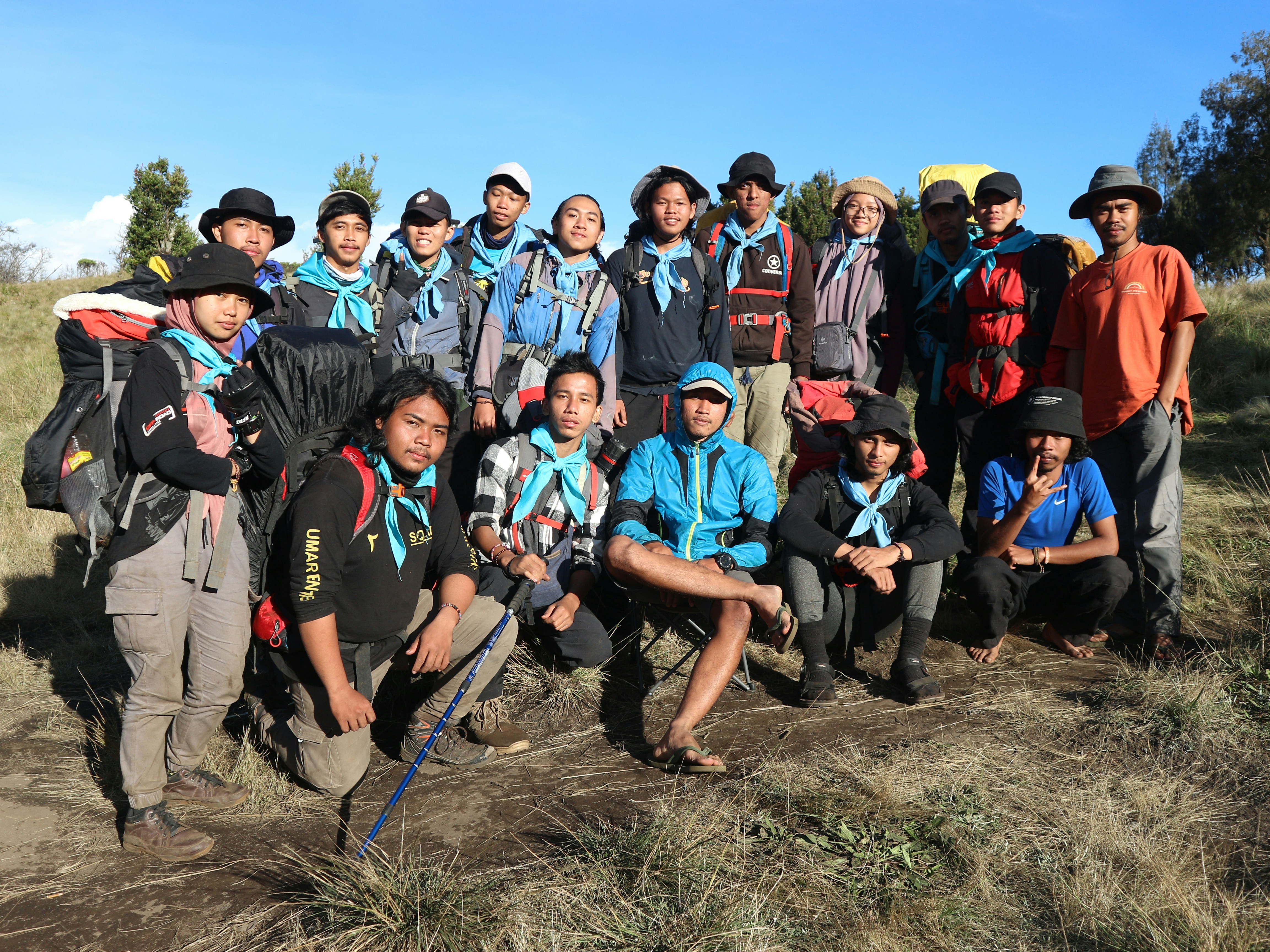 Group of trekkers on a dirt road