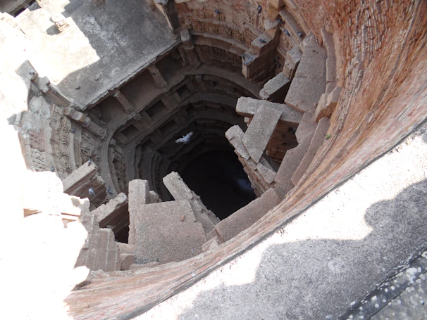 Ancient stepwell with intricate stone carvings reflecting centuries of history.