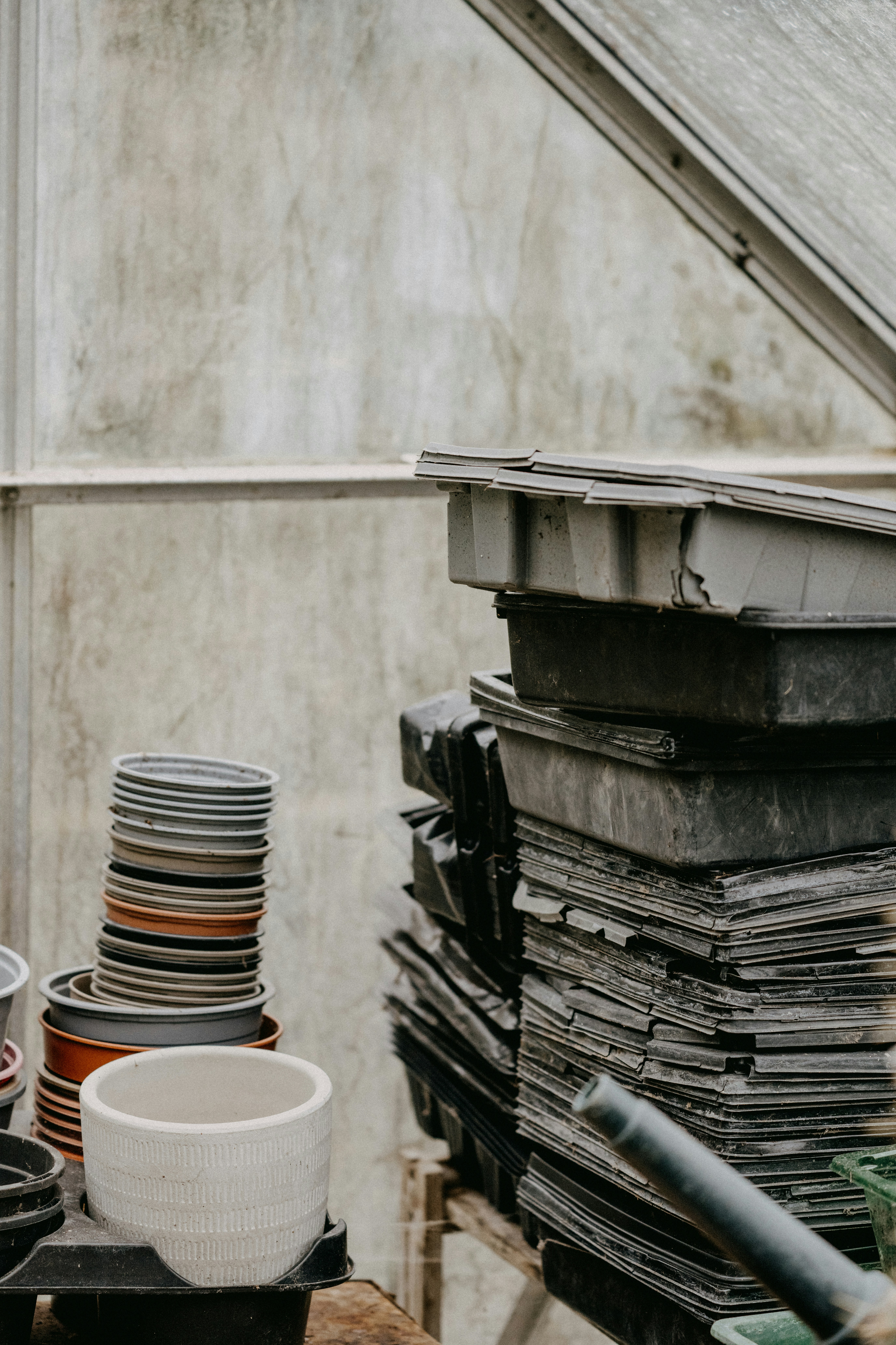 a stack of plates sitting on top of a wooden table
