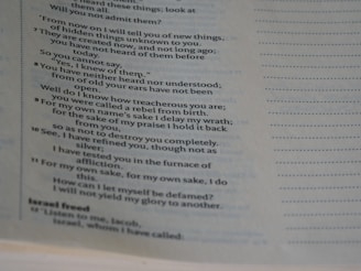 A close-up image of a page from a book containing printed text from a Shakespeare play.