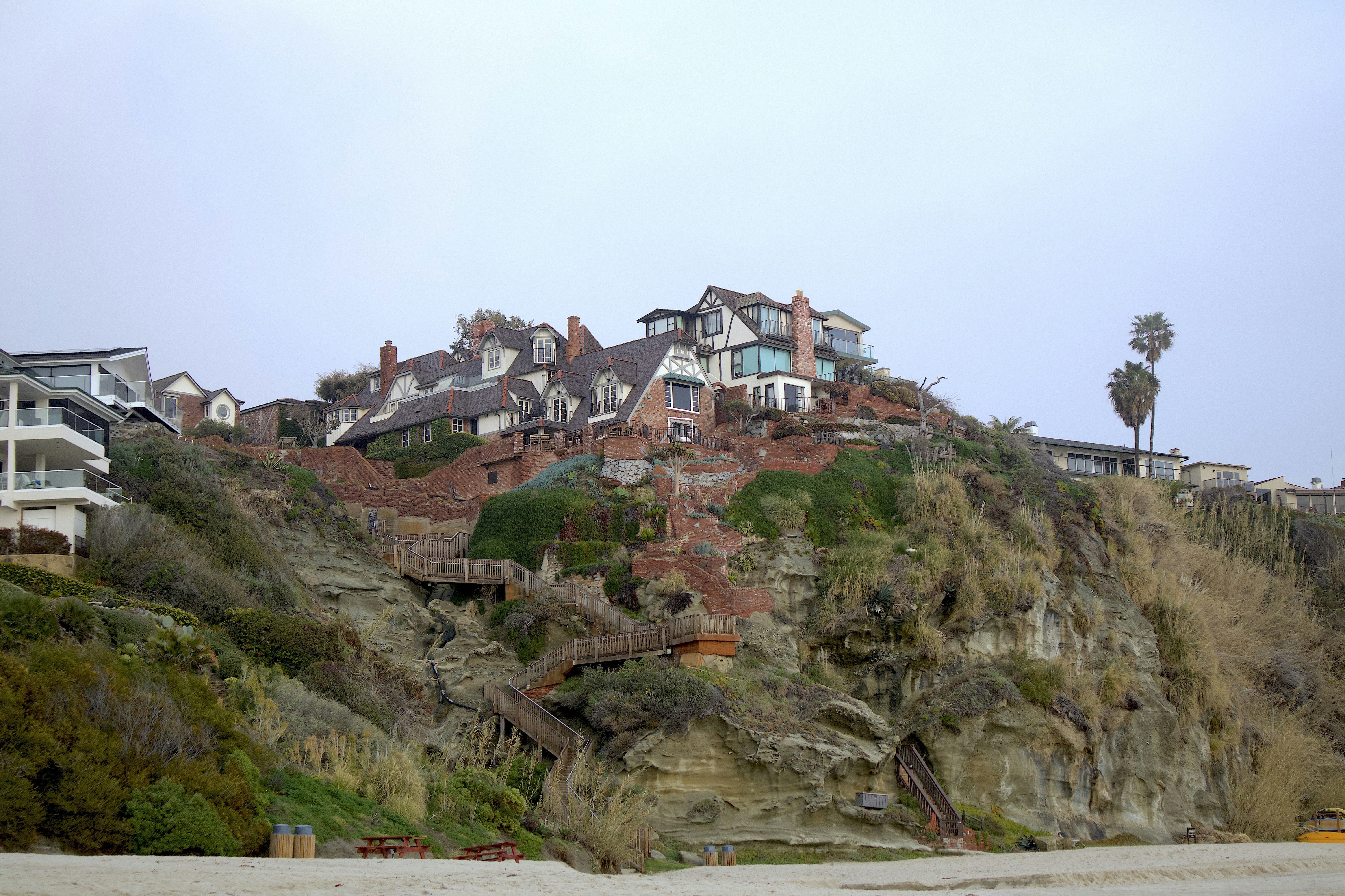 a hillside with houses on top of it