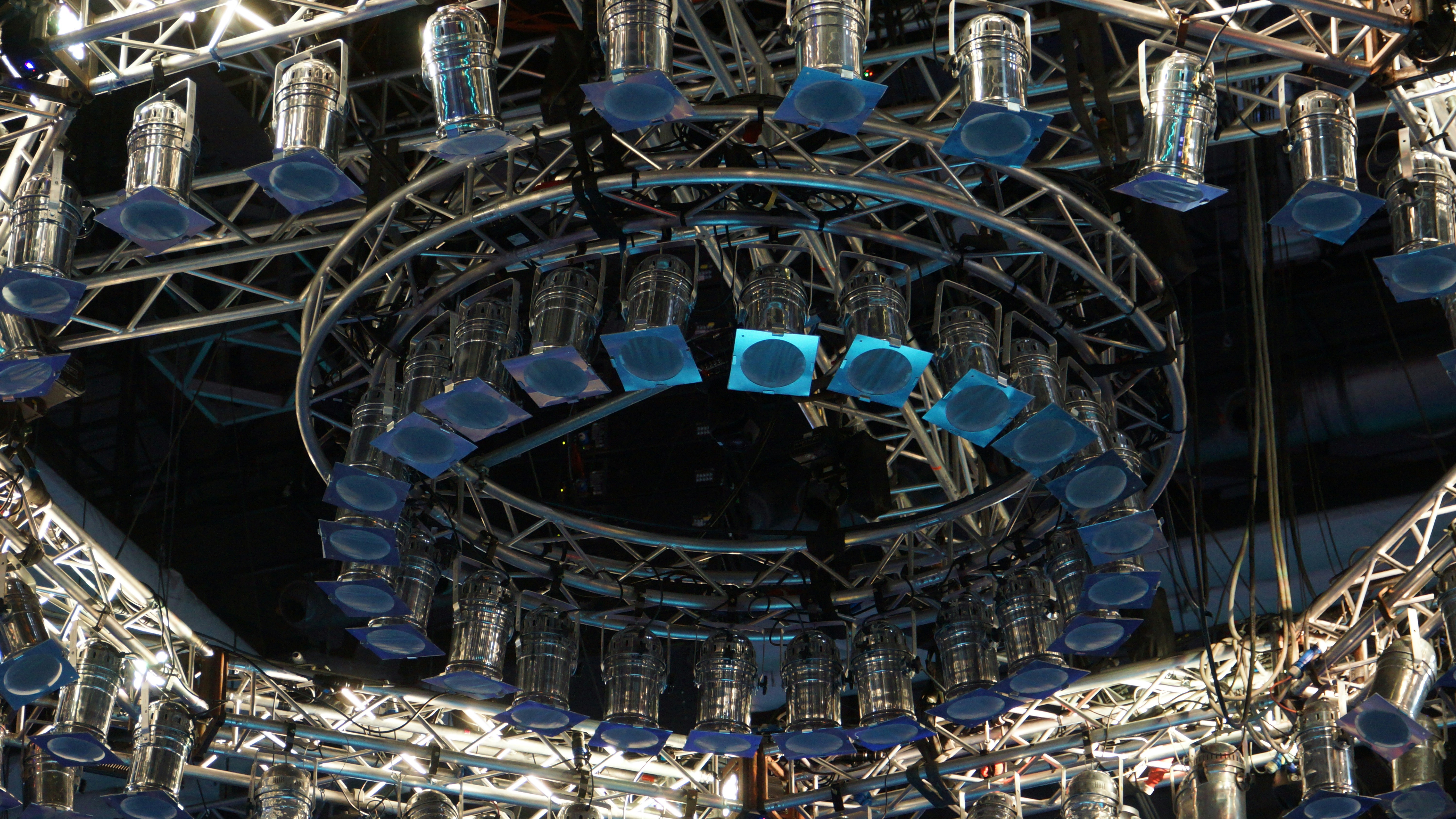 a large metal structure with lots of blue lights