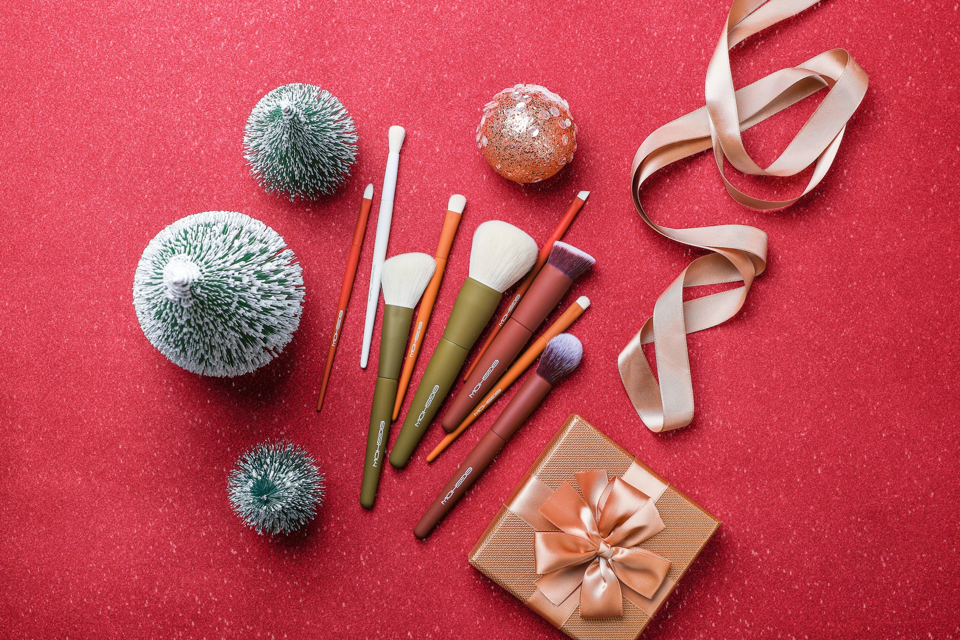 a red table topped with lots of different types of items