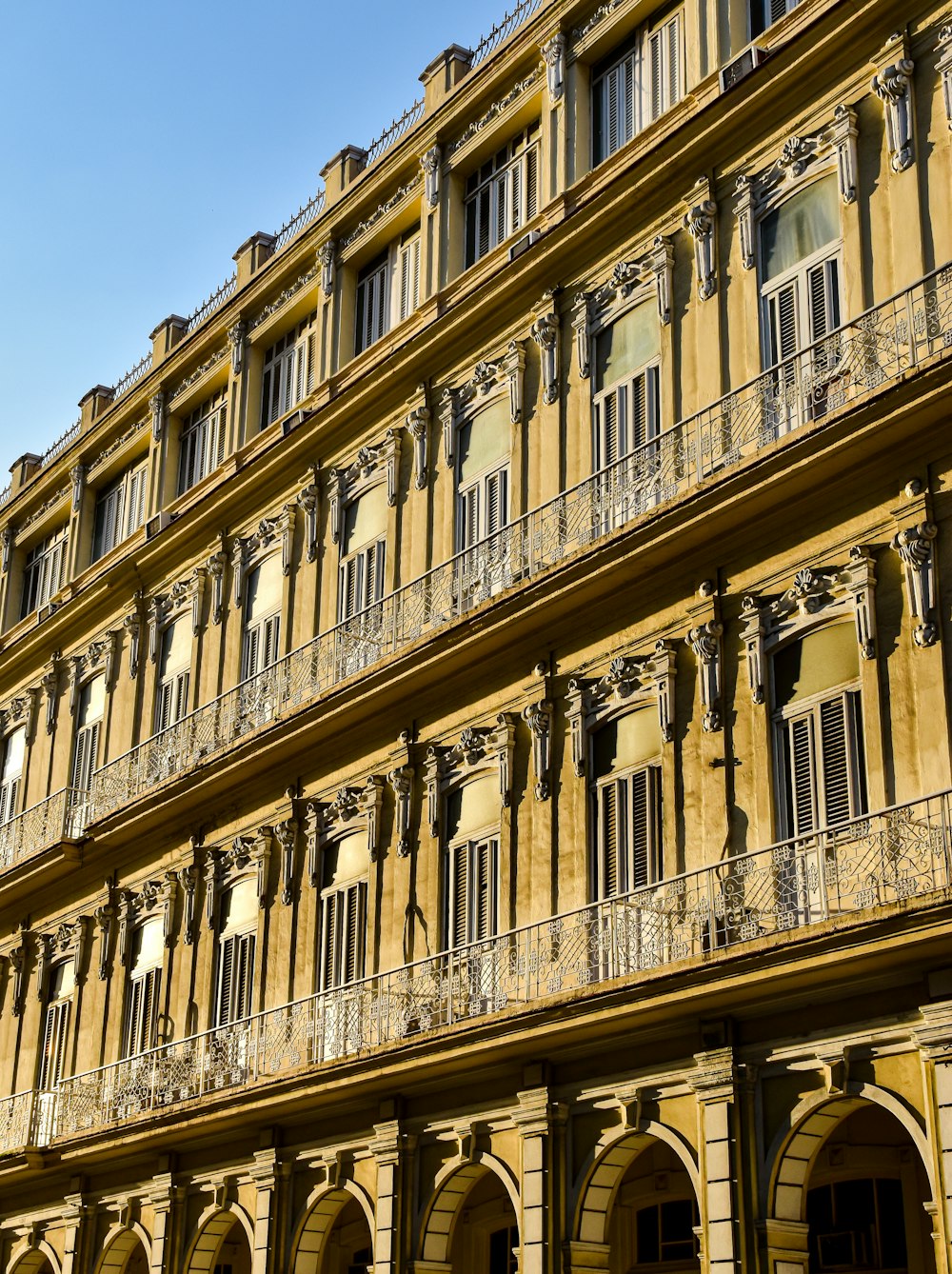 a tall building with balconies and balconies on the balconies