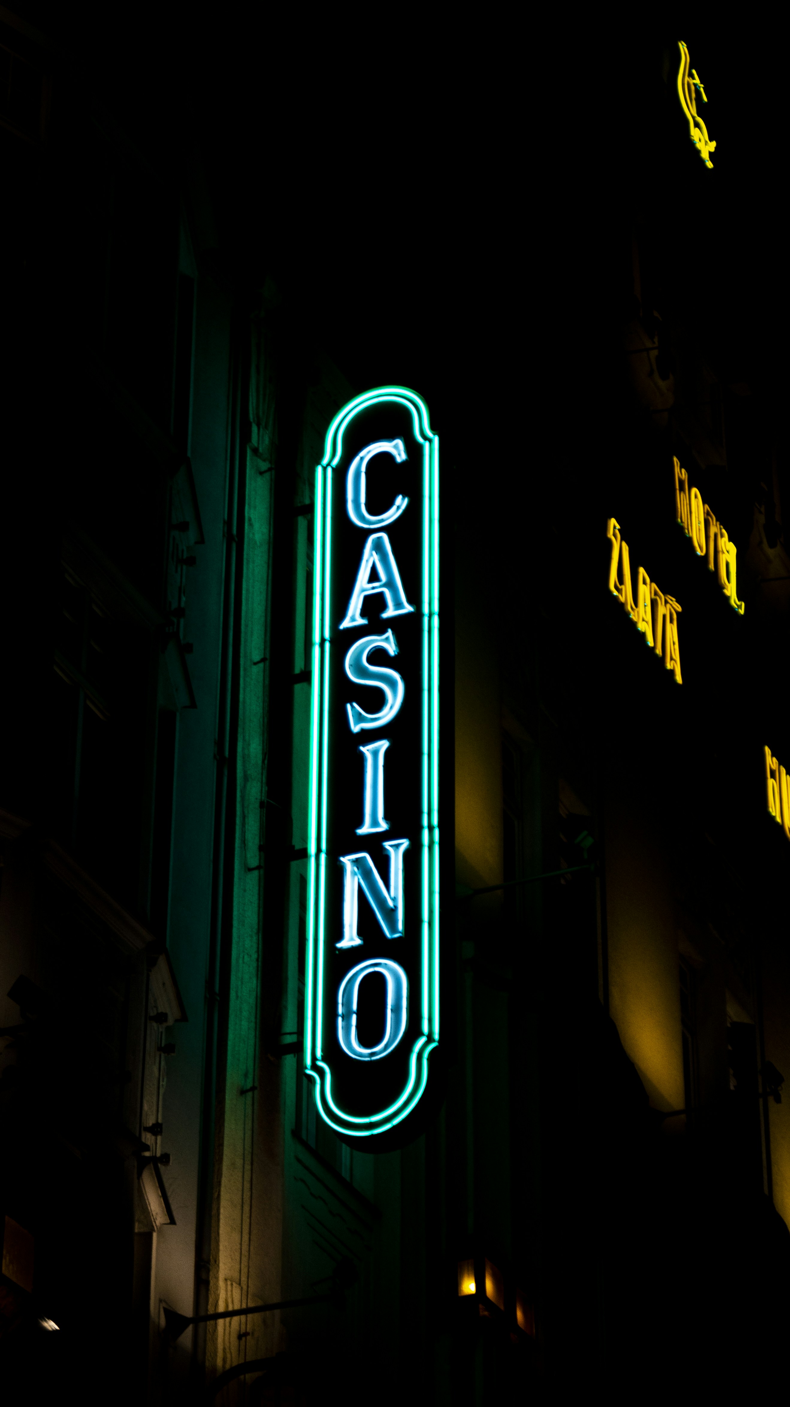 a neon sign on the side of a building