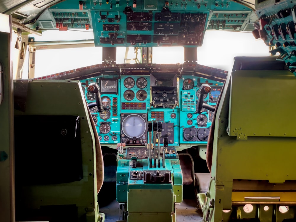 the cockpit of an airplane with multiple instruments