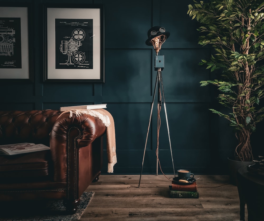 a living room with a couch and a floor lamp