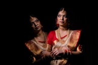 a couple of women standing next to each other