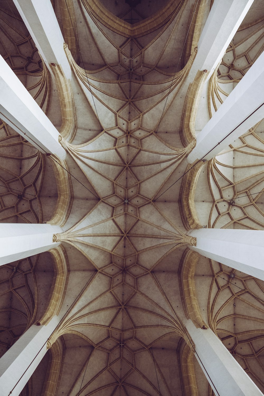 the ceiling of a building with a very high ceiling