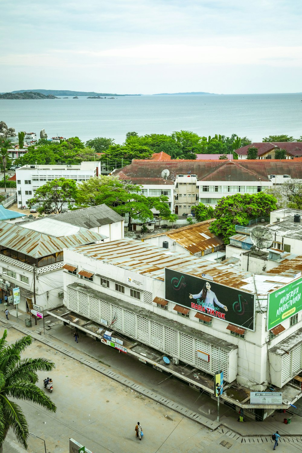 a view of a city with a large body of water in the background