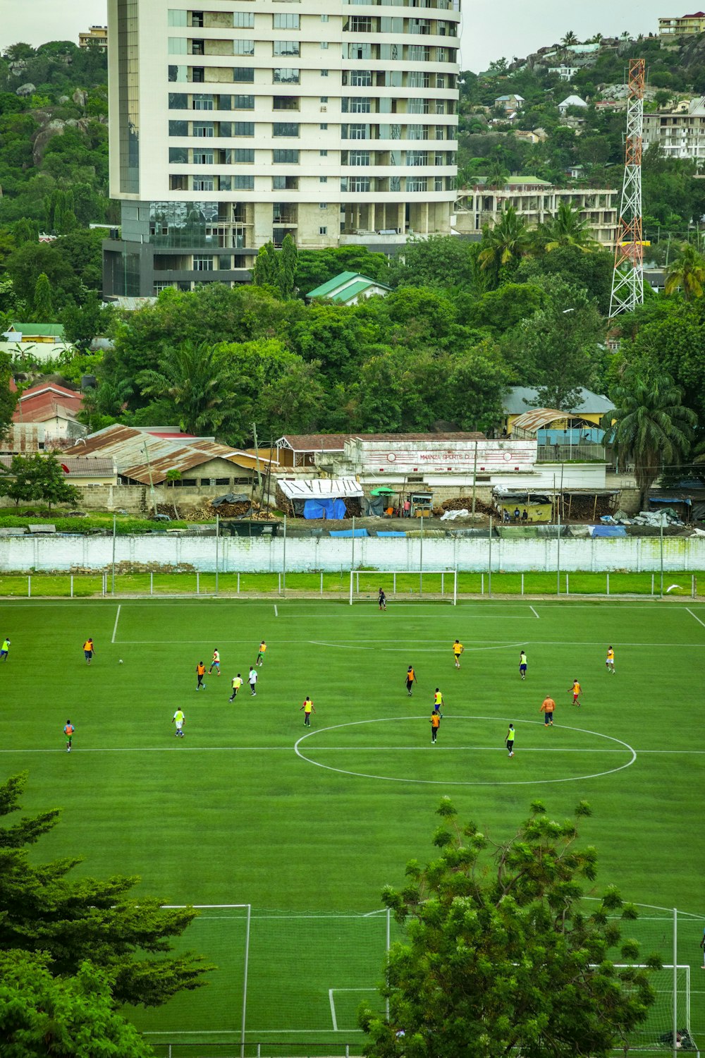 a group of people playing a game of soccer