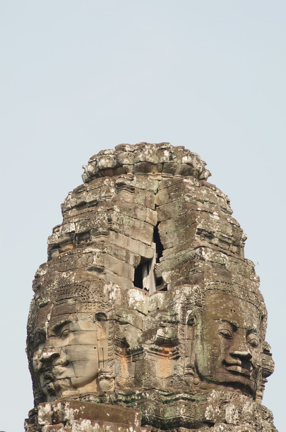 a close up of a face on a building