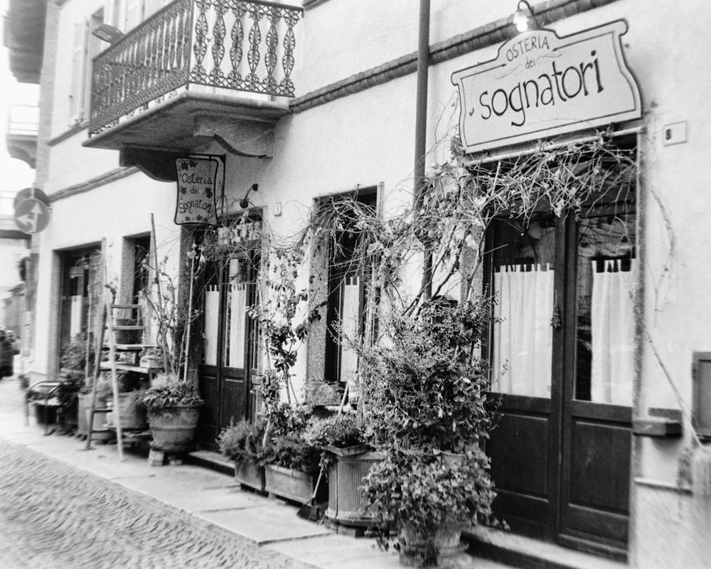 a black and white photo of a store front