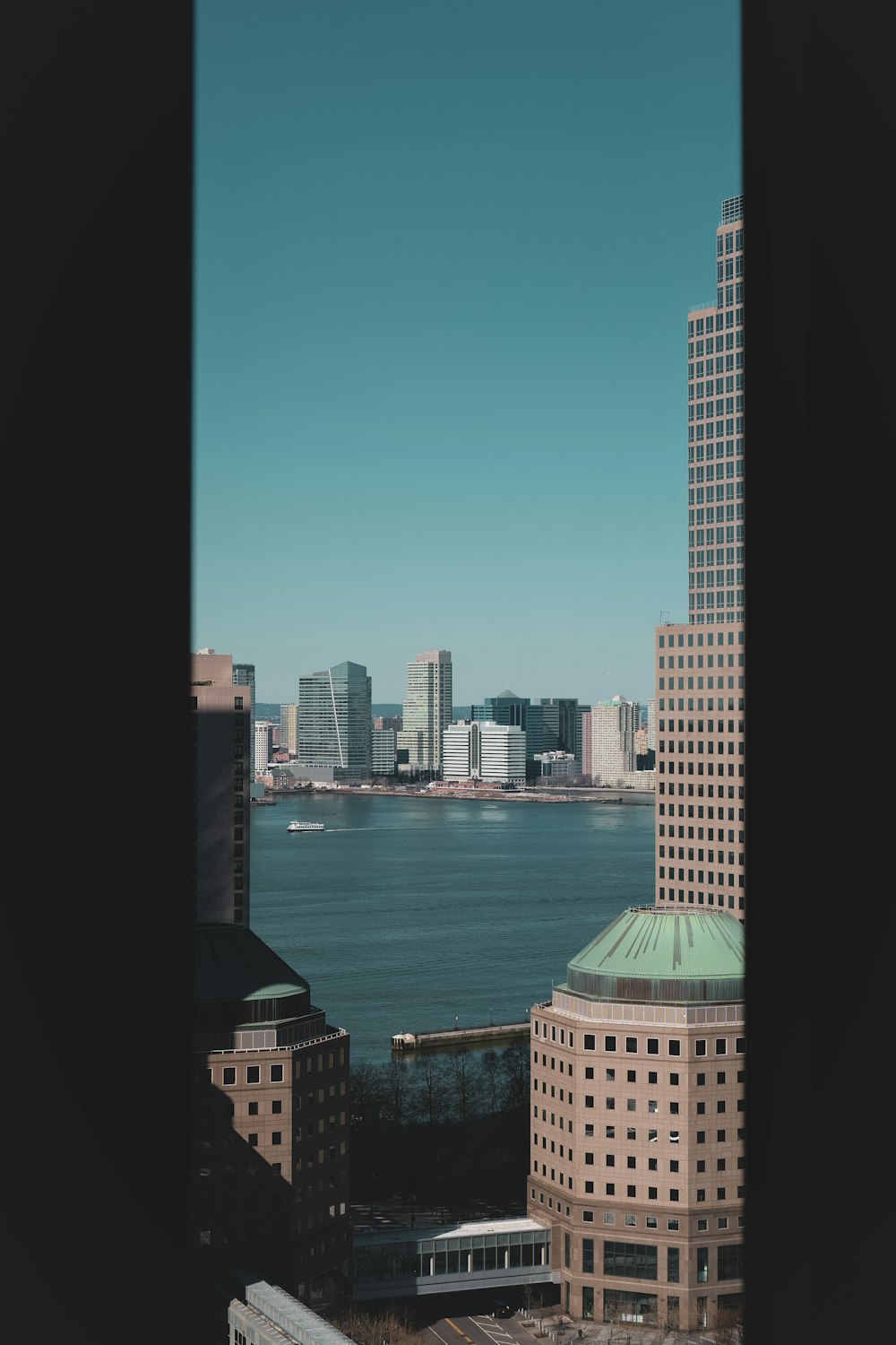 a view of a large body of water from a high rise building