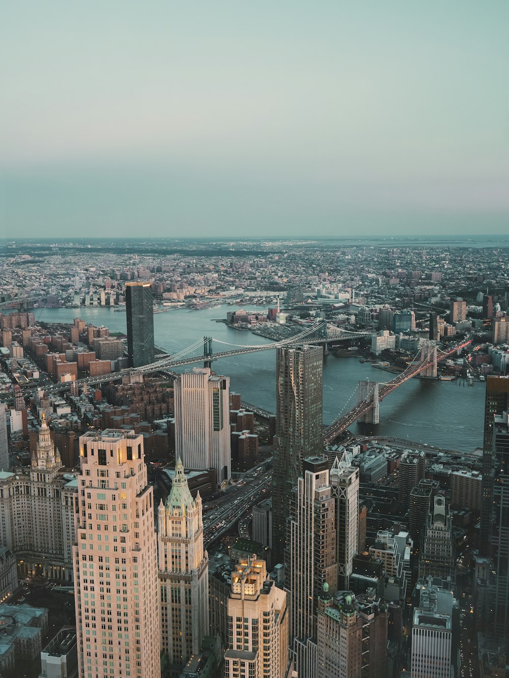 an aerial view of a city with tall buildings