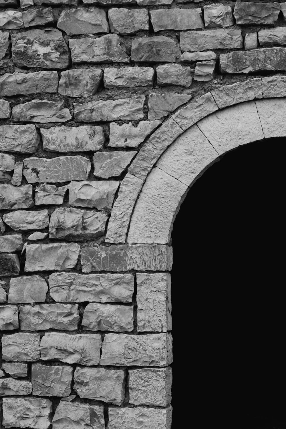 a black and white photo of a doorway