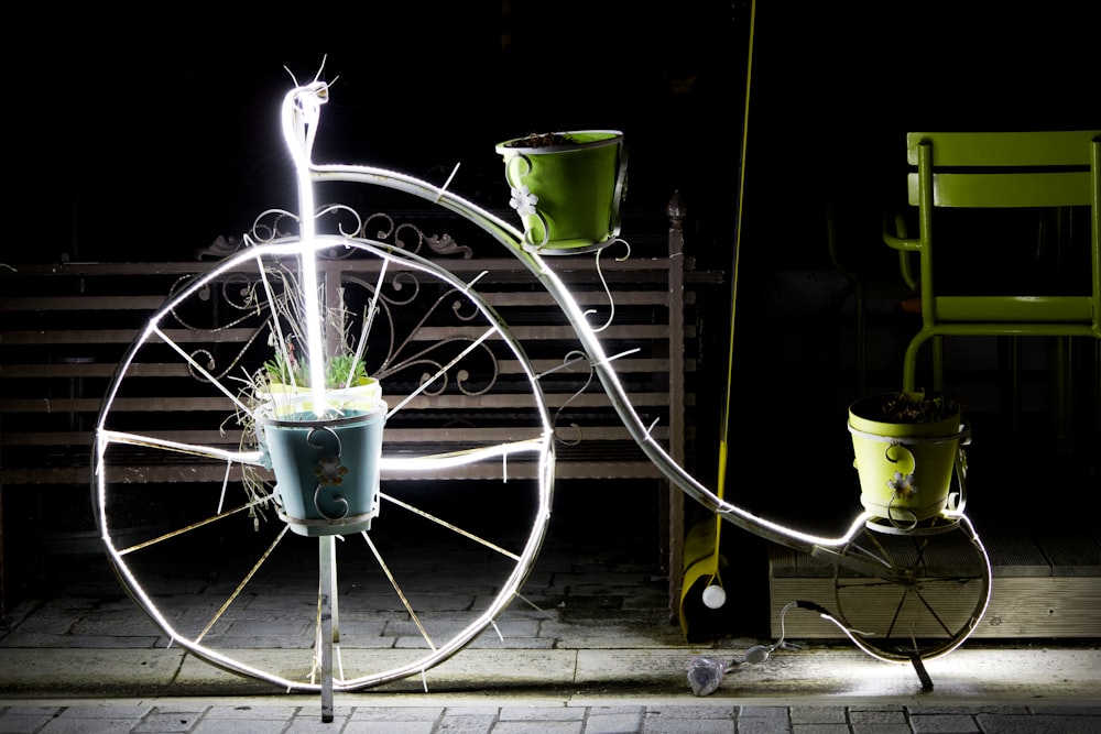 a bicycle with a planter attached to it