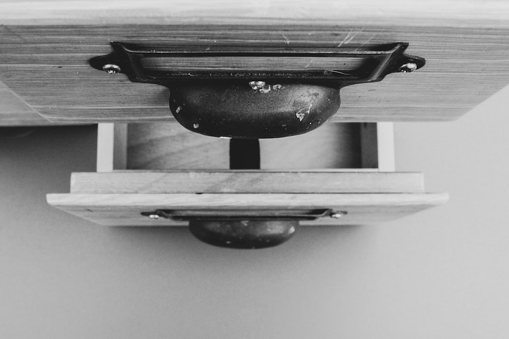 a black and white photo of a light fixture