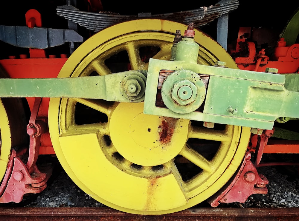 a close up of the wheels of a train
