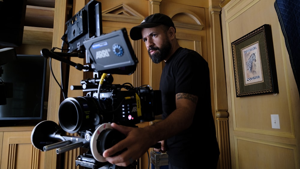 a man standing in front of a camera