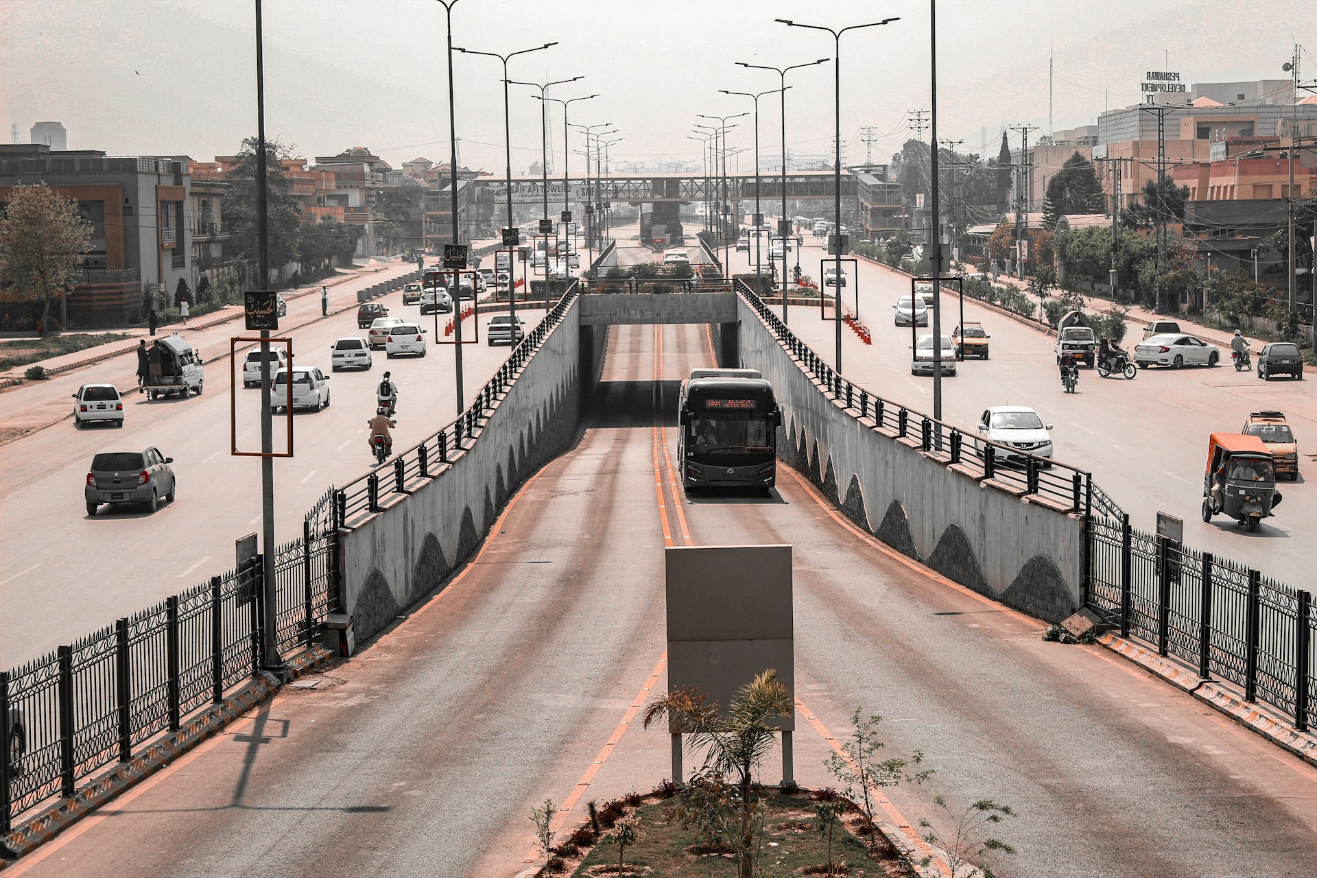 a city street filled with lots of traffic