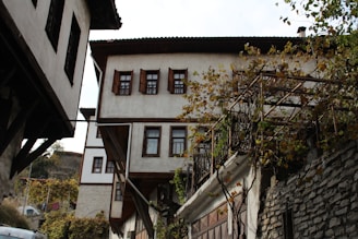 Traditional farmhouse architecture with wooden beams and stone walls in Nashik.