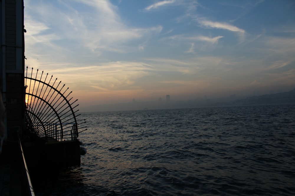 a view of a body of water at sunset