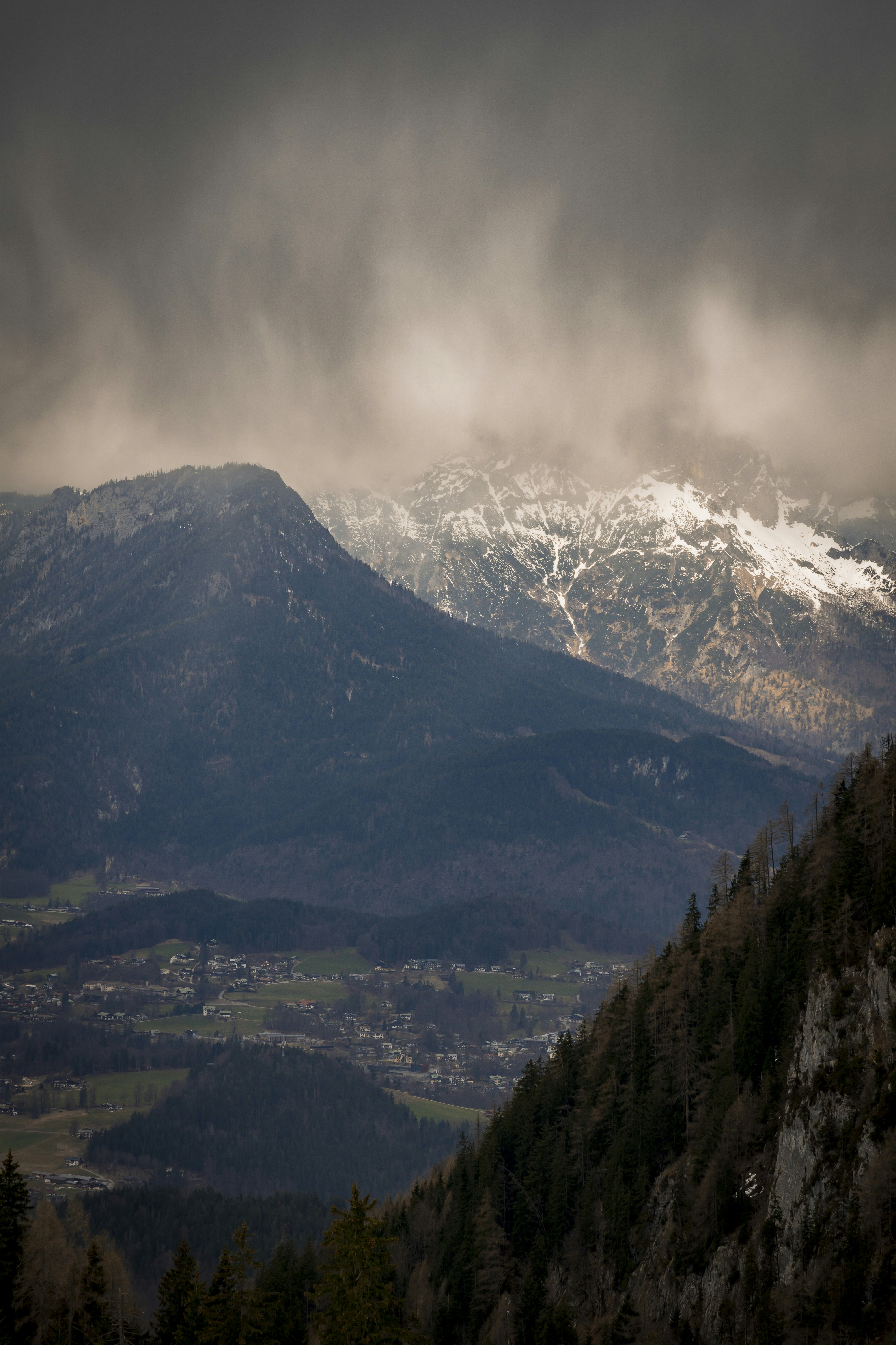 a view of a mountain range with snow on the top