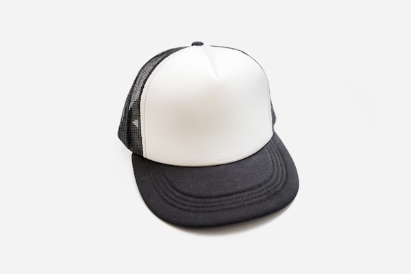 Embroidered trucker cap on white background
