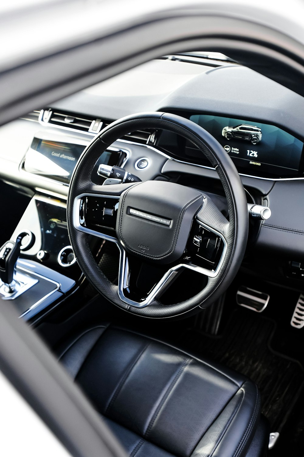 the interior of a car with a steering wheel