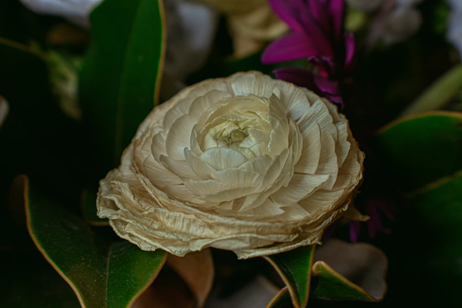 Paper flowers arranged in a simple vase