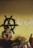 A person sits thoughtfully holding drumsticks in a dimly lit room. The wall behind features a large black anarchy symbol, and several sheets of paper with writing are pinned up. The drum set and a guitar are visible, adding to the atmosphere of a music practice space.