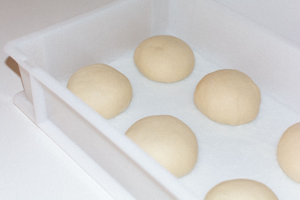 a box of doughnuts sitting on top of a counter