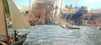 A detailed 3D simulation of water flow around a ship's hull under various sea conditions.