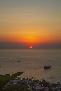 A vibrant sunset over a tropical beach, symbolizing travel adventures.