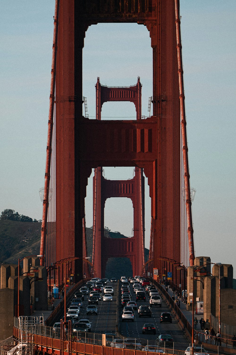 a very tall bridge with a bunch of cars on it