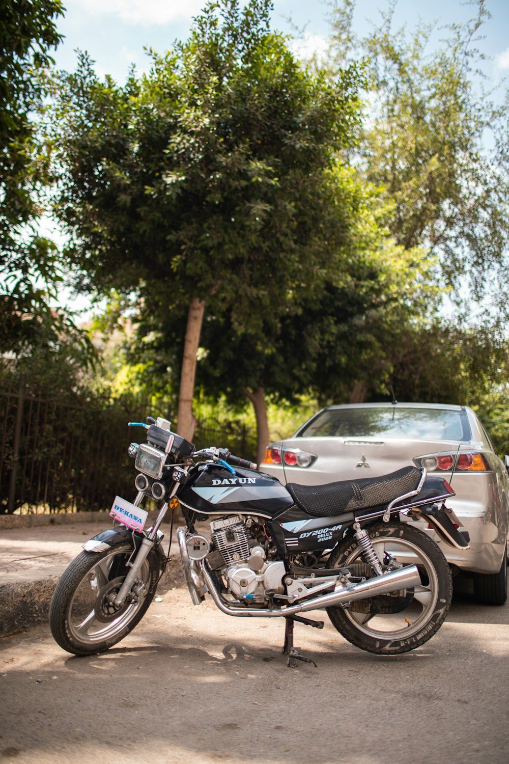 a motorcycle parked on the side of the road