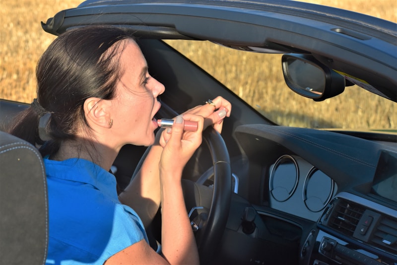 Confident woman enjoying luxury car lifestyle