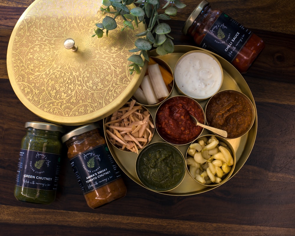 a variety of condiments are arranged on a plate