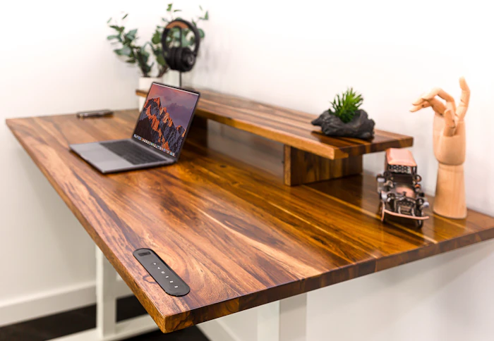 Wooden desk with laptop
