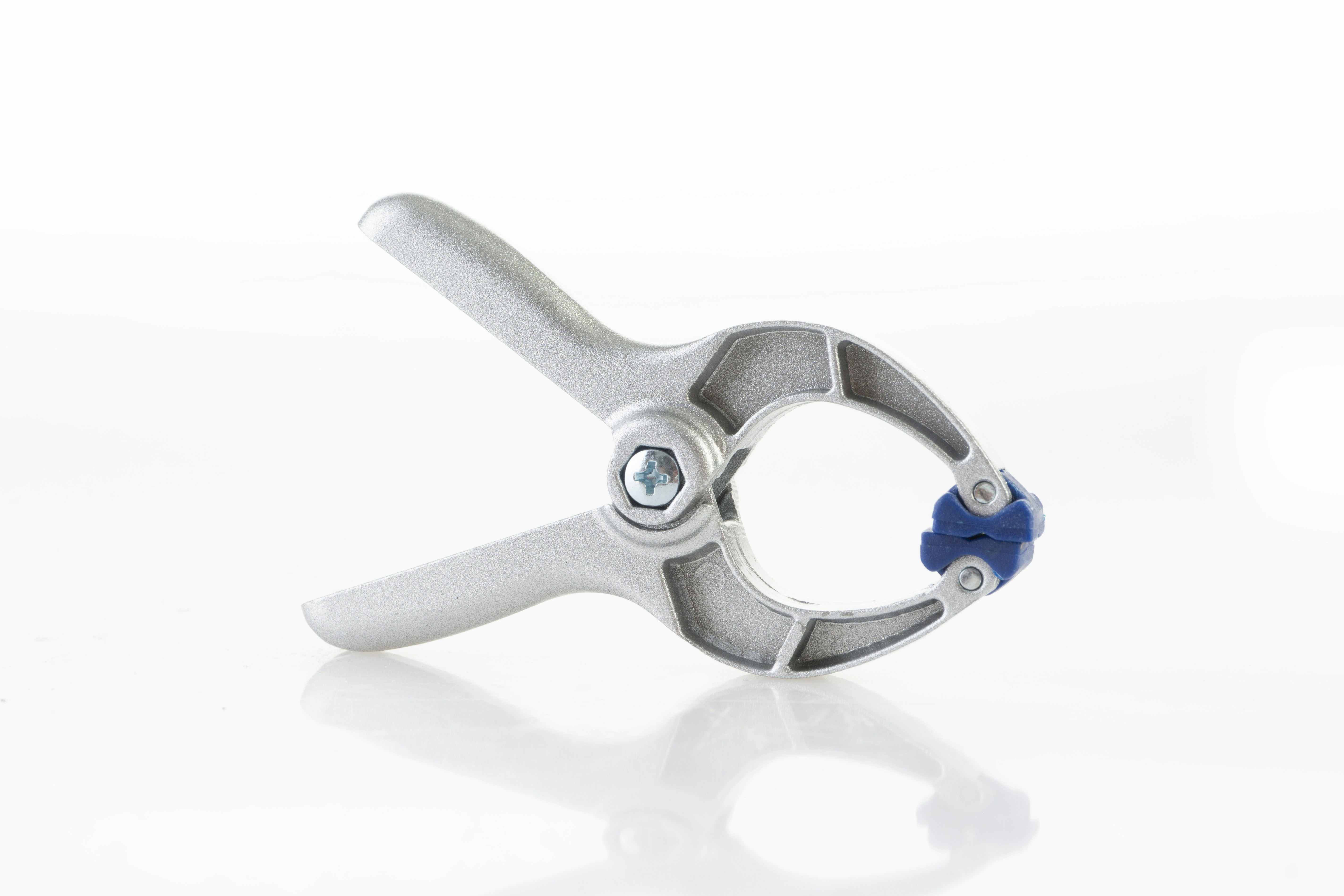 a close up of a pair of scissors on a white surface